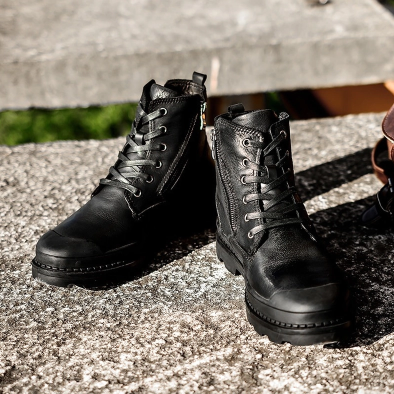 Men's gothic combat boots with brown fur lining option and genuine leather upper showing premium craftsmanship