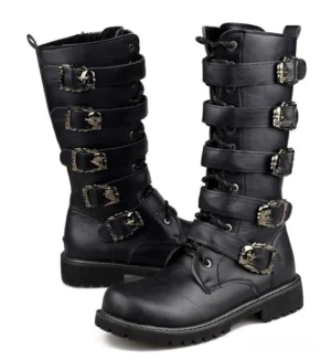 Stacked metal skull buckles on black PU leather mid-calf combat boots three-quarter angle