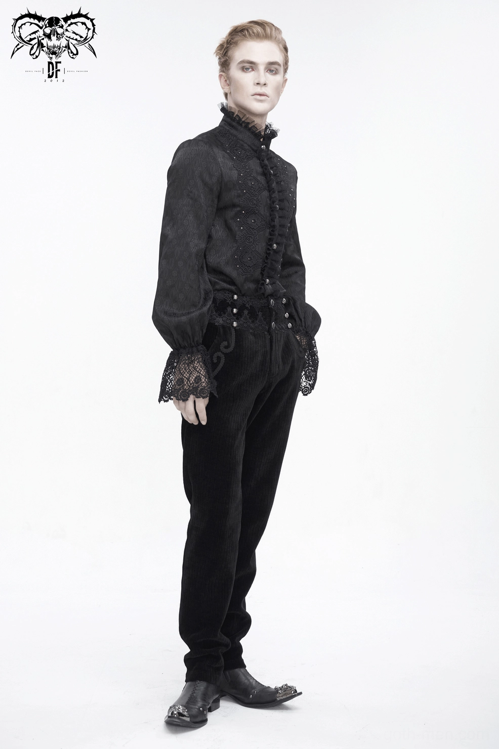 Black gothic cargo corduroy pants with distinctive lace trim and scroll embroidery design elements