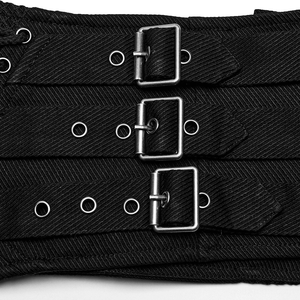Macro view of silver rectangular metal buckles and adjustment hardware on gothic corset belt