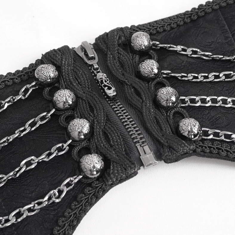 Extreme close-up detail of black gothic corset belt showing carved metal studs and multi-layer chains
