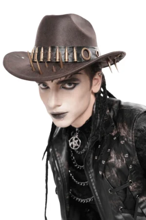 Brown gothic cowboy hat with resin bullet band and metal spikes - front three-quarter view on male model with goth makeup and punk leather outfit