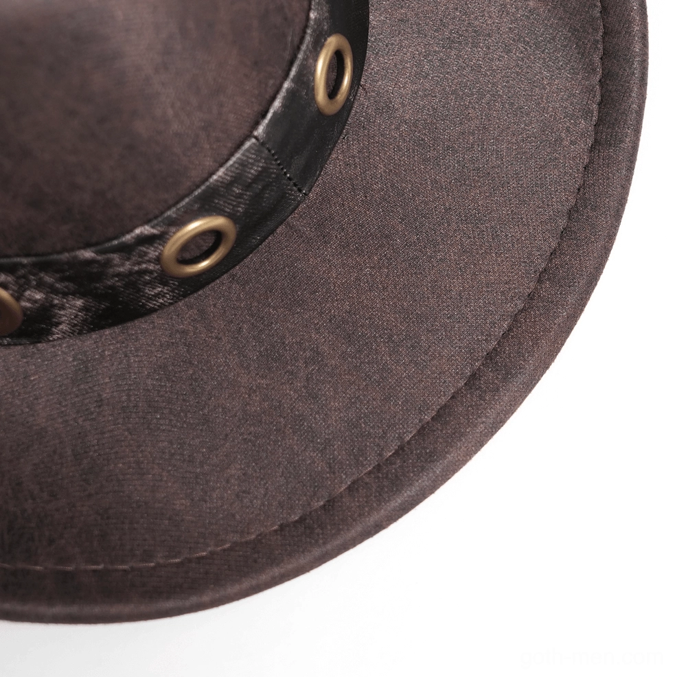 Brown gothic cowboy hat front facing view emphasizing bullet and spike metal trim details on mannequin display