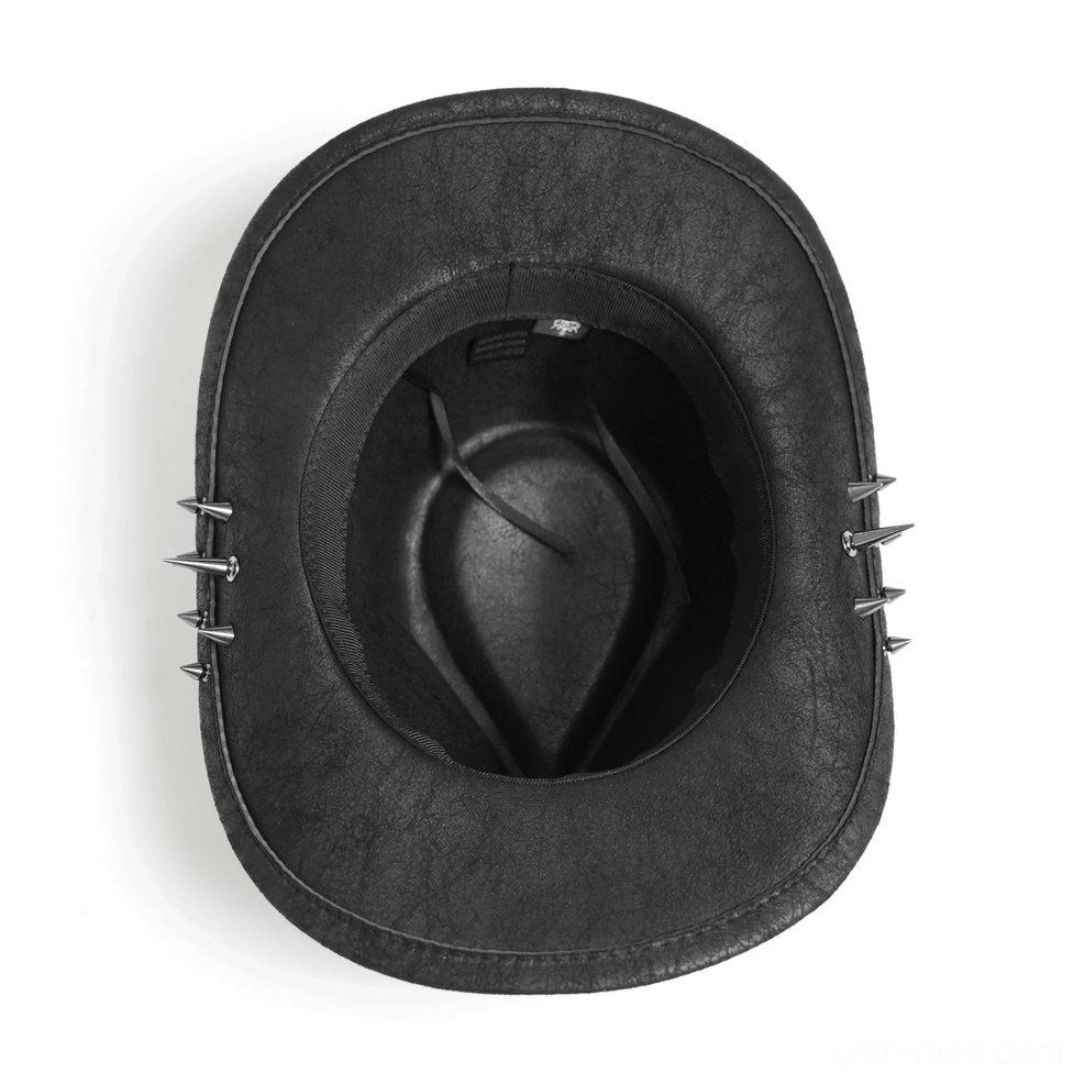 Interior side view of black gothic cowboy hat showing metal spikes along outer brim edge