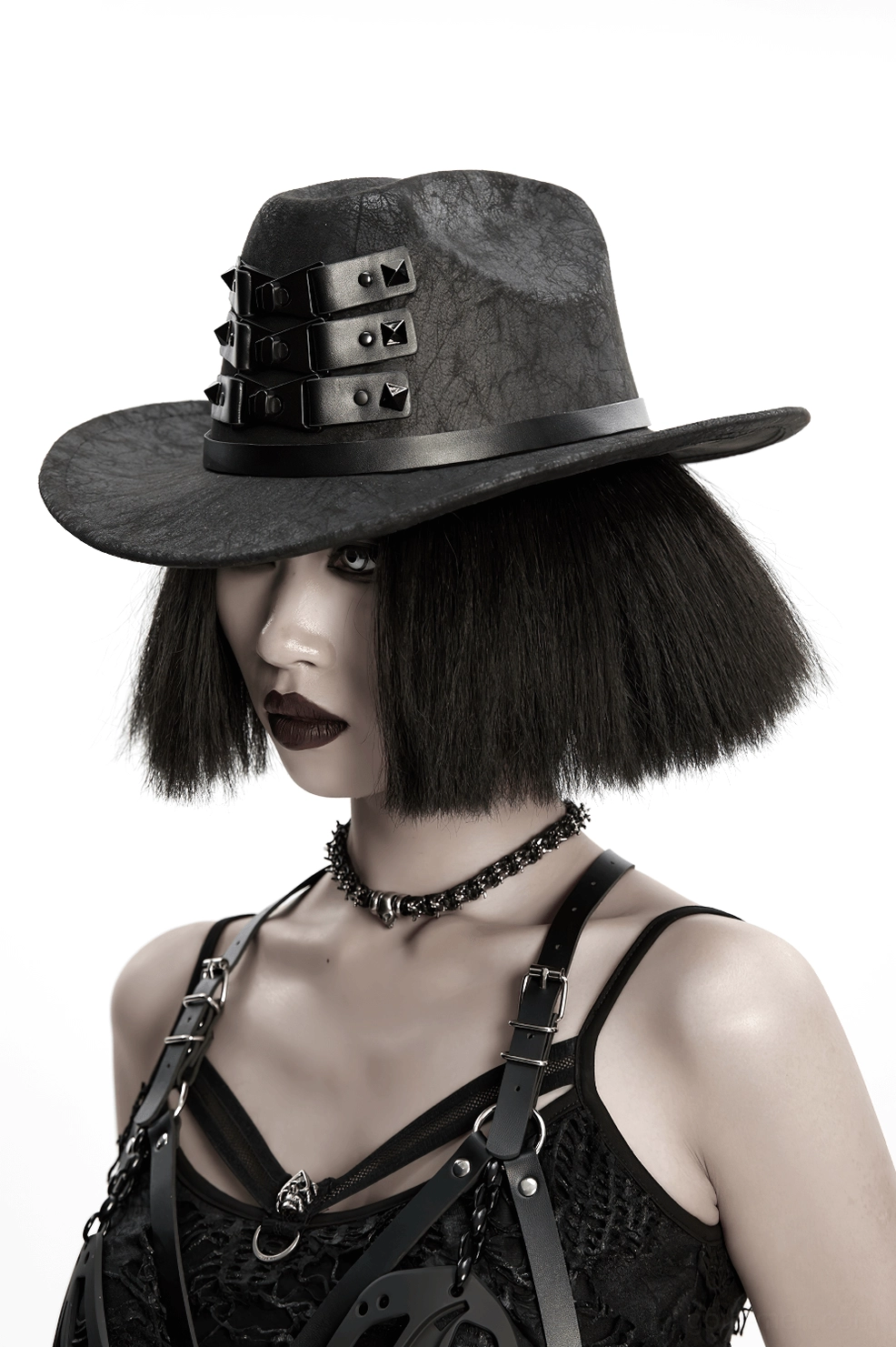 Rear angle view of black gothic cowboy hat with buckle strap details