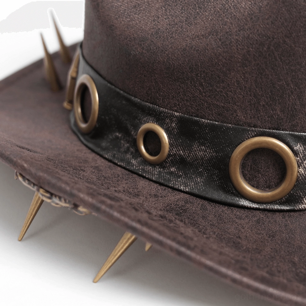 Detailed view of gothic cowboy hat spike brim trim showing sharp metallic spikes and synthetic leather texture