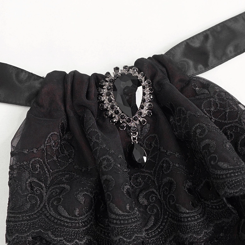 Detail of large faux diamond pendant on black paisley embroidered lace gothic cravat