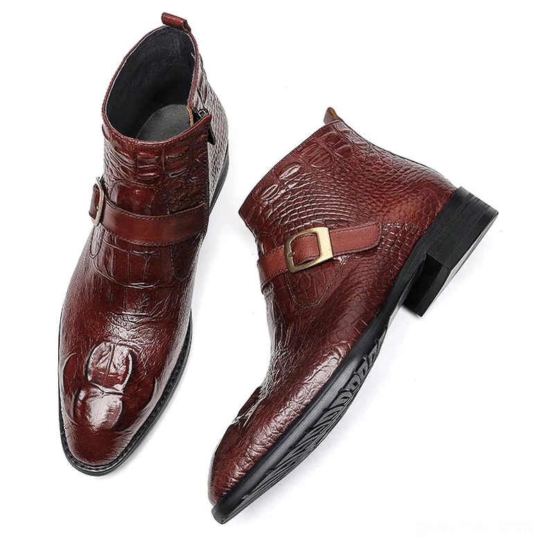 Gothic crocodile embossed leather ankle boots with buckle strap, oblique top view brown color