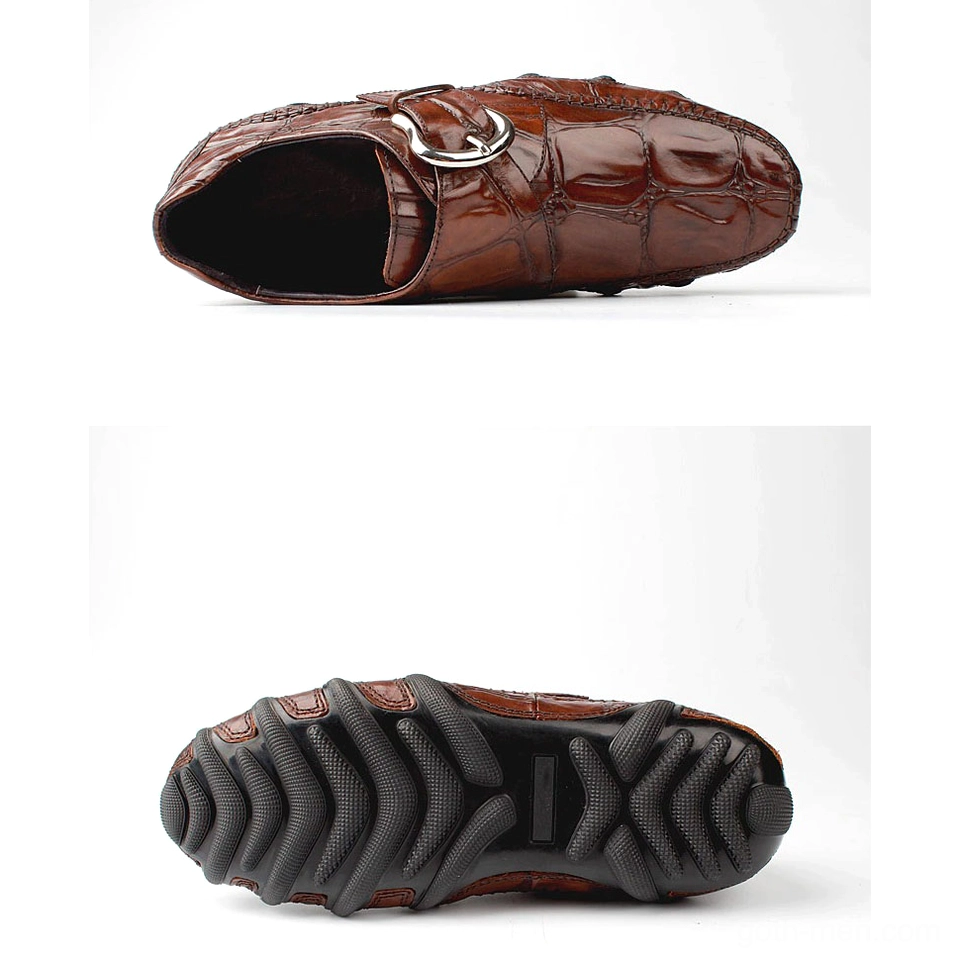 Non-slip rubber outsole of men's gothic crocodile loafers, bottom sole view showing tread pattern