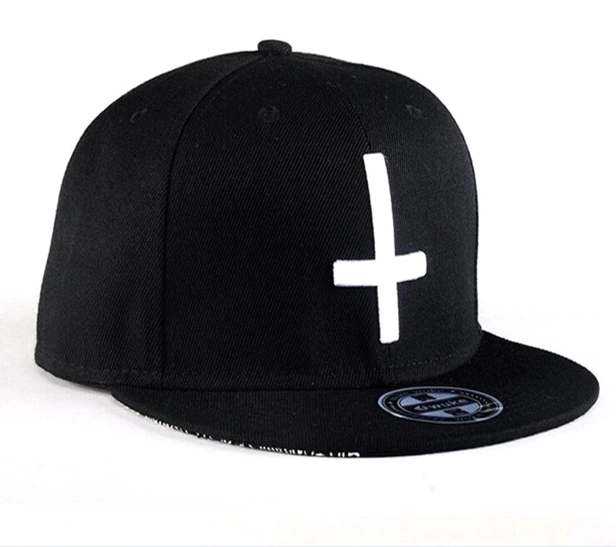 Front three-quarter view of black gothic snapback baseball cap featuring white cross embroidery and flat brim
