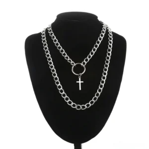 Silver double-layered gothic cross chain necklace with circle connector and cross pendant displayed on black jewelry mannequin