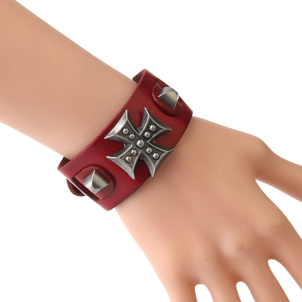 Red gothic cross leather wrap bracelet worn on mannequin wrist, side view showcasing metal cross detail and adjustable cuff design