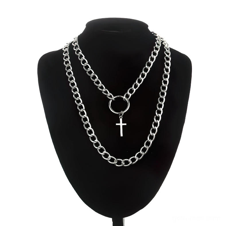 Silver punk chain necklace with cross pendant, layered metal design displayed on black jewelry mannequin, front elevation view