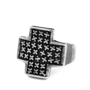 Polished silver gothic cross ring with dense cross pattern engravings, front three-quarter view showing bright metallic finish