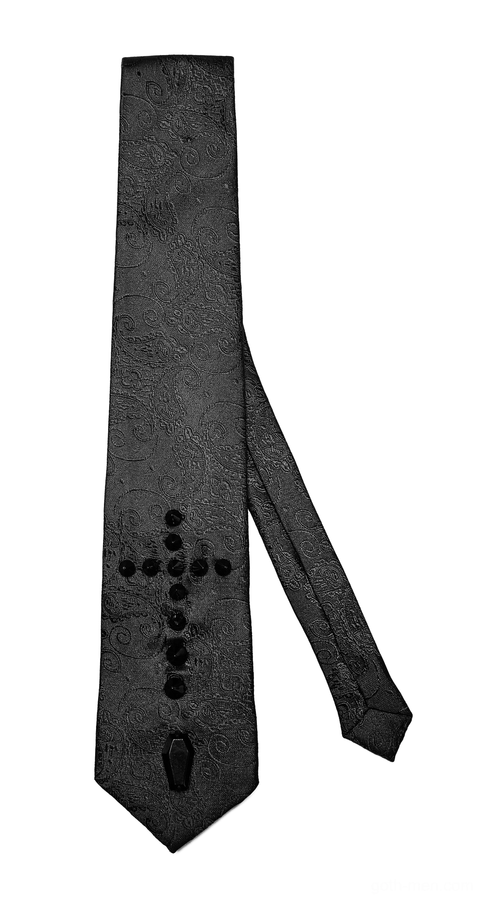 Gothic necktie side flat lay showcasing cross stud decor, coffin pendant, and swirl jacquard weave texture of black fabric