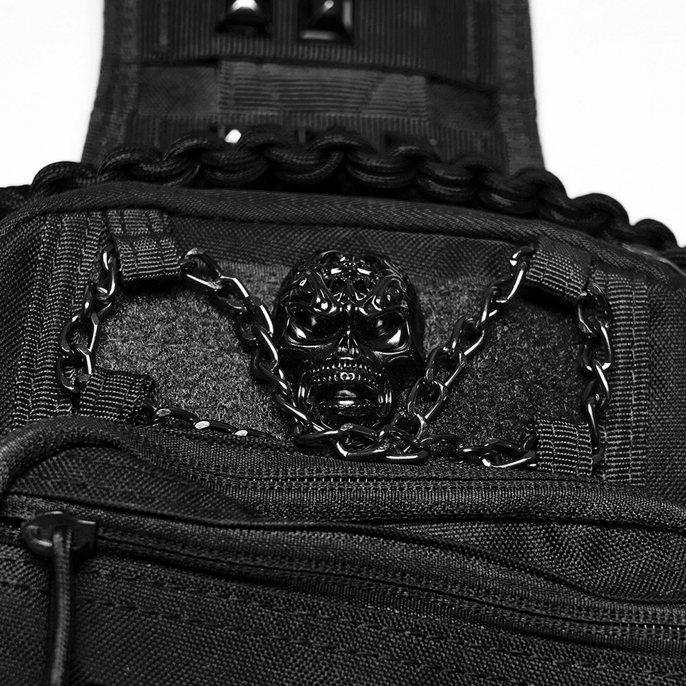Metal skull hardware and chain accent details on black gothic crossbody backpack