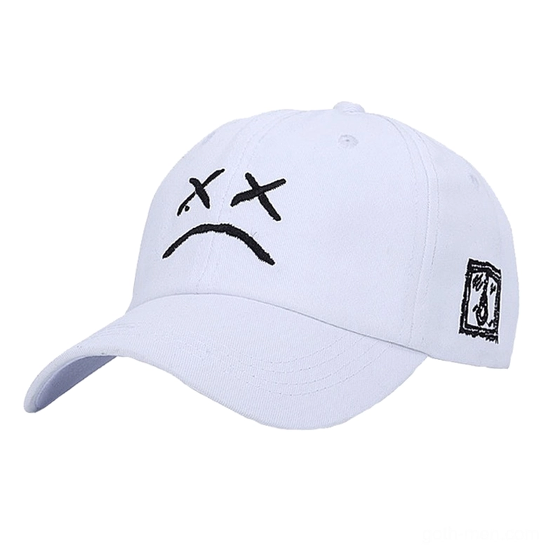Light gray gothic baseball cap with embroidered sad face pattern, front view detail shot