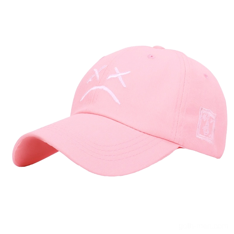 Pink soft goth crying face cap with embroidered emotional design, side angle studio photography