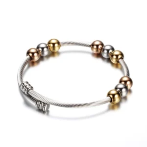 Adjustable stainless steel gothic bracelet side view showing twisted silver band and screw clasp