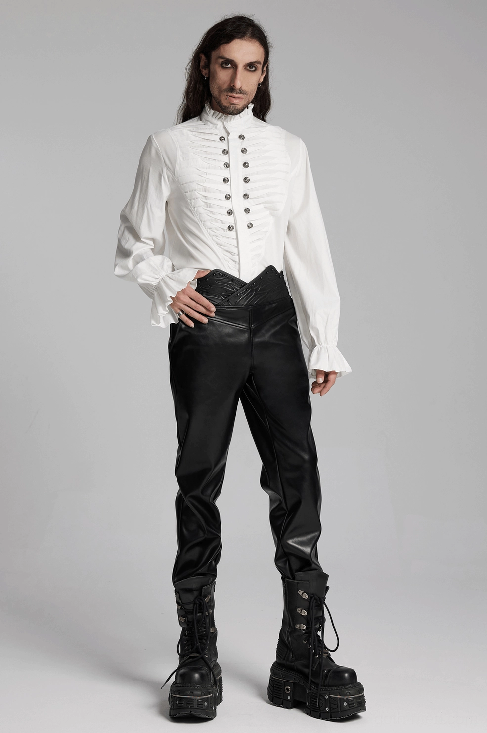 3D curved waistband with embellished studs, gothic-inspired metallic decoration on sculptural waist design