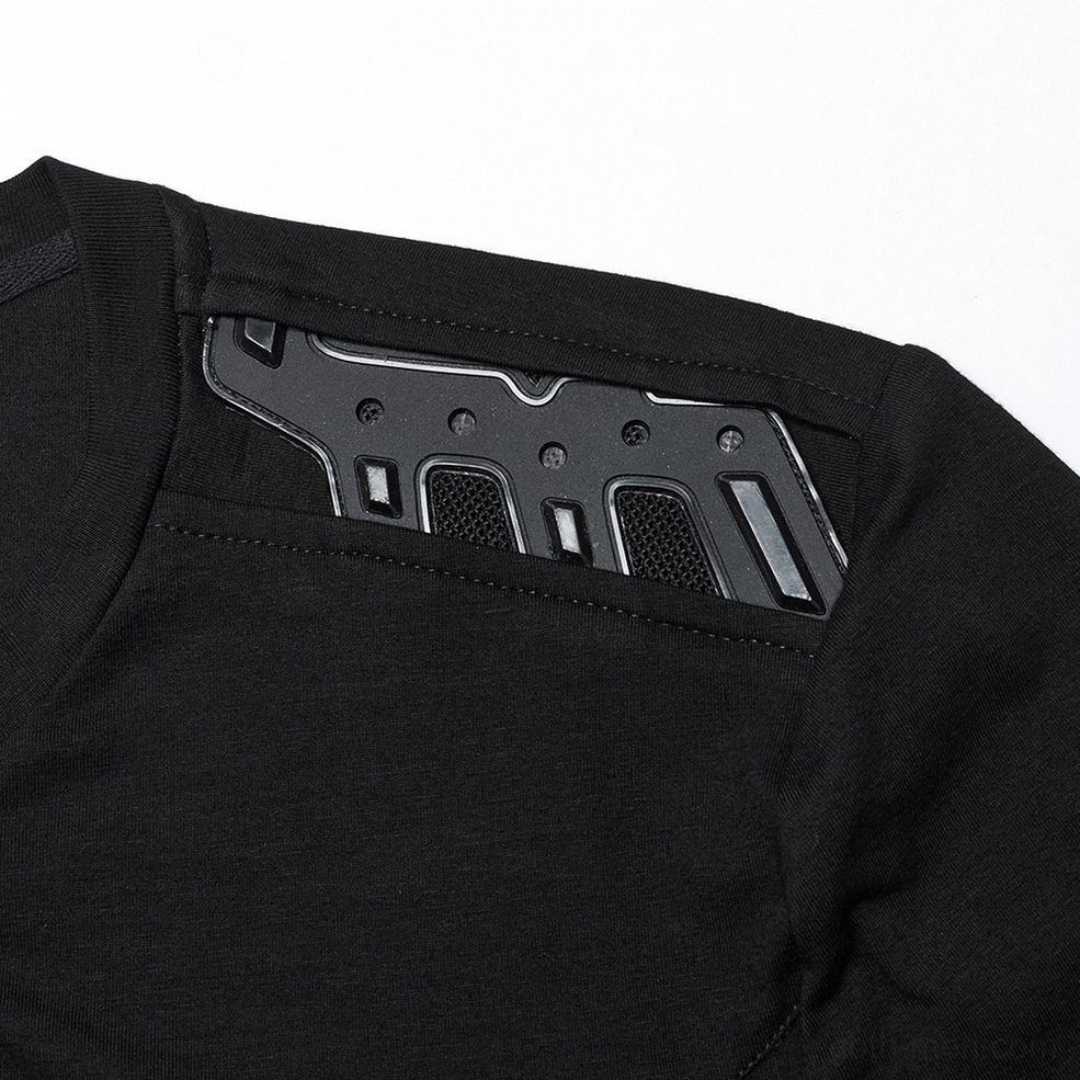 Close-up of black shoulder armor detail with matte tactical plating and mesh ventilation accents