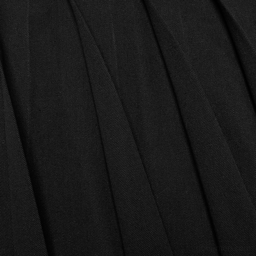 Black gothic pleated half skirt waistband showing 3D cyberpunk embossed design and side buckle attachment
