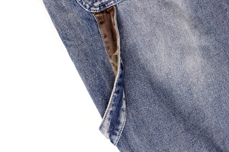 Men's baggy gothic denim capris leg opening and hem detail - loose silhouette ankle exposure