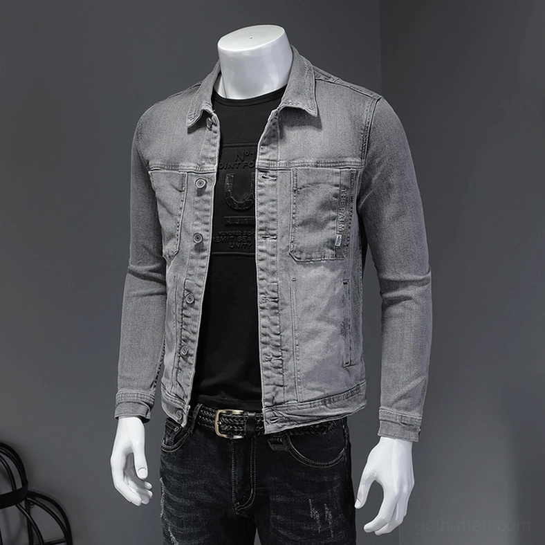 Gothic denim jacket styled with dark jeans and leather belt - alternative fashion outfit