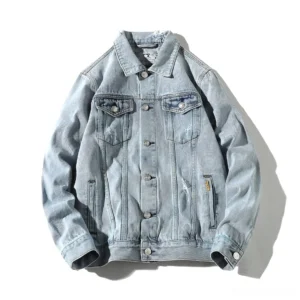 Dark rebel denim jacket flat lay showing distressed back panel, chest utility pockets, and button details - gothic alternative menswear