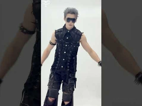 Black lace-up denim shirt cropped view on model showcasing punk biker styling and metal hardware details