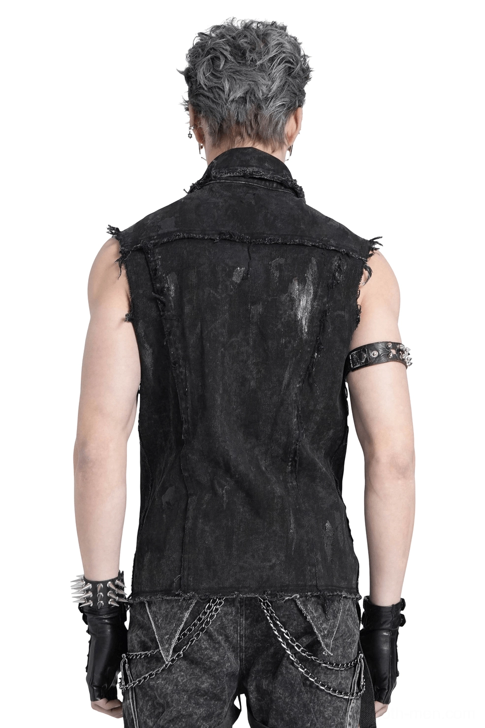 Black distressed denim shirt back view on model, displaying frayed edges and chain details, goth alternative fashion