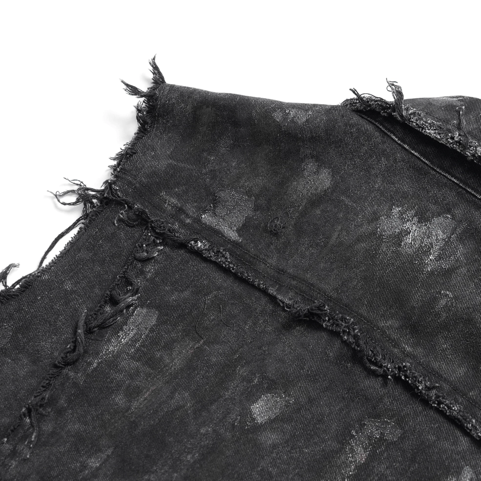Black studded denim shirt styling detail showing metal stud placement and industrial goth embellishments