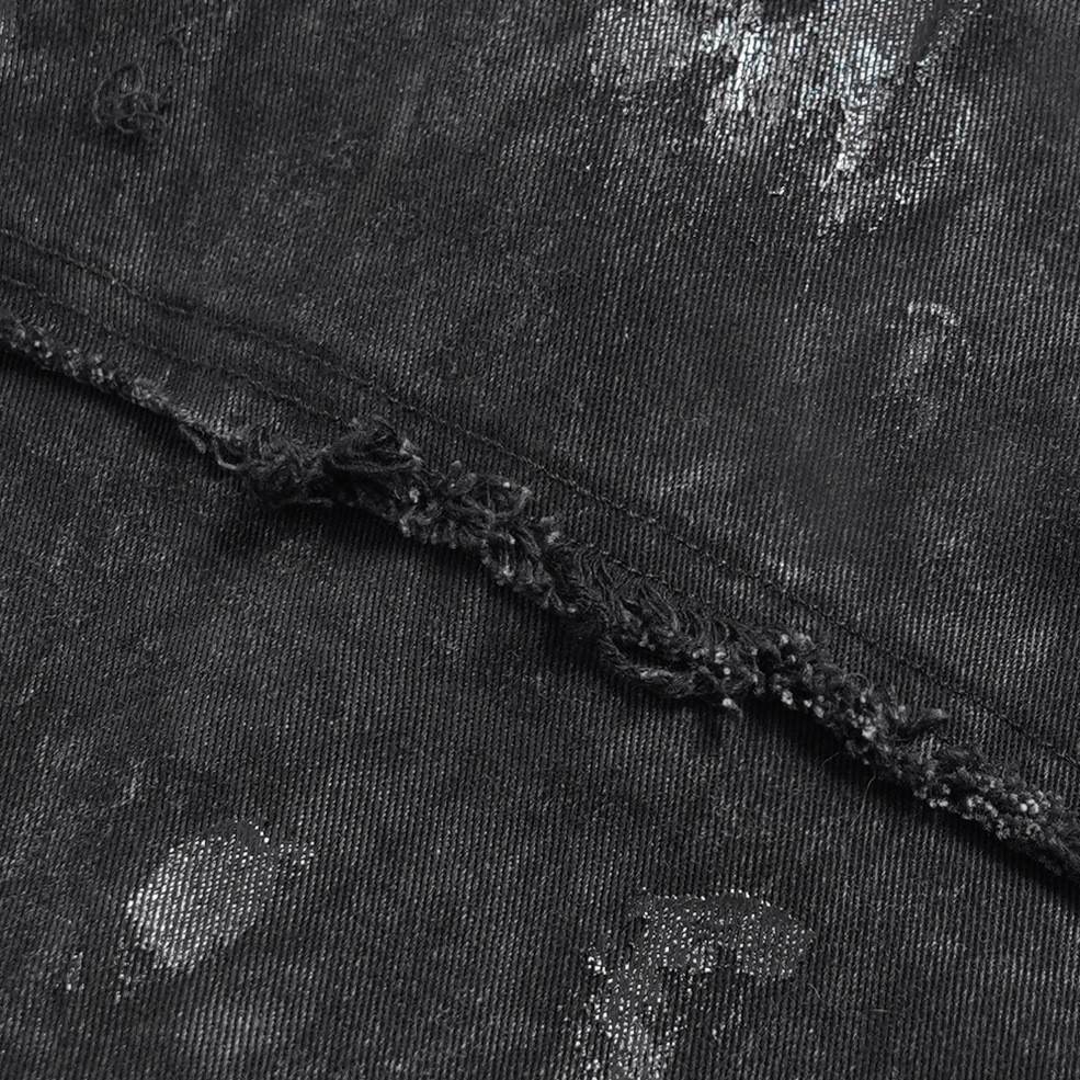 Alternative fashion black denim shirt with lace-up closure worn with gothic accessories and styling