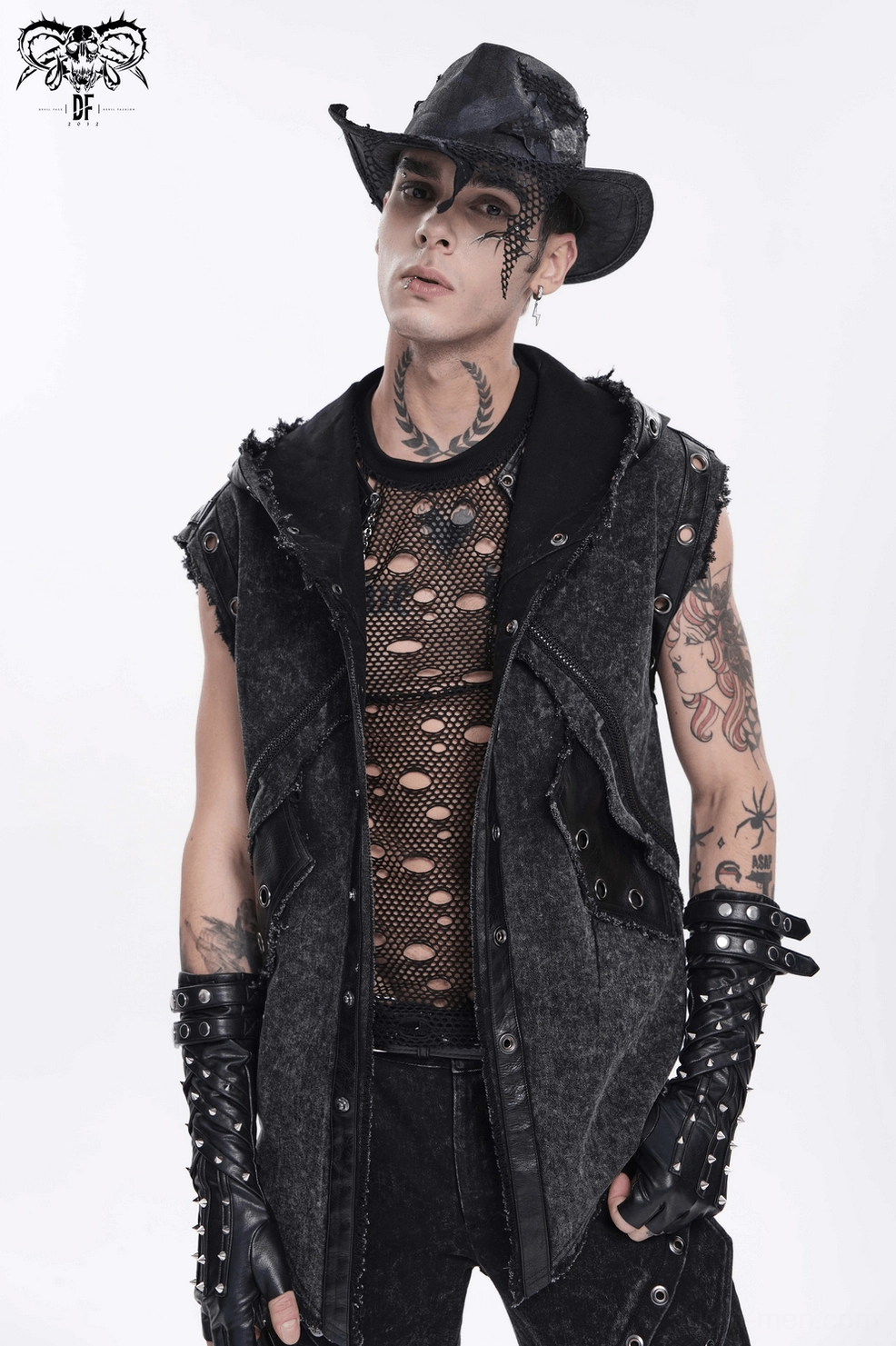 Gothic distressed cowboy hat front view highlighting fishnet patches and intentional wear pattern aesthetic