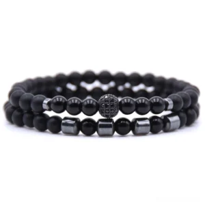 Dark aesthetic stone bracelet duo featuring black base with blue stone accents and metallic spacers