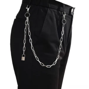 Silver gothic double-layer wallet chain with lock pendant on black jeans, side view showing dual strand punk style design