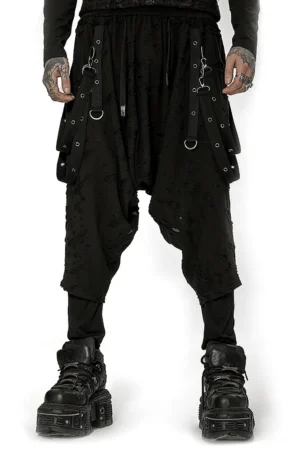 Black gothic drop-crotch cargo pants front view with metal D-ring straps and distressed perforated knit fabric