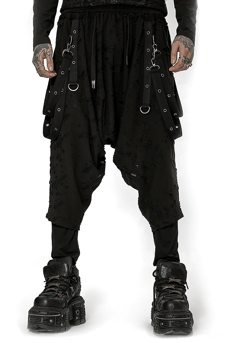 Black gothic drop-crotch cargo pants front view with metal D-ring straps and distressed perforated knit fabric