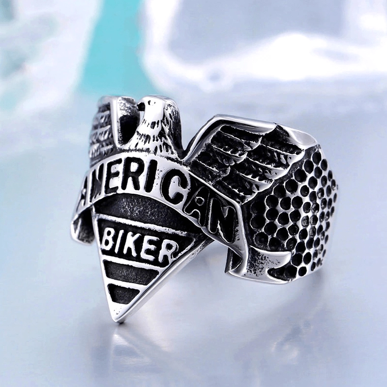 Two-tone eagle signet ring detailed view showing craftsmanship of engraved text and feather work