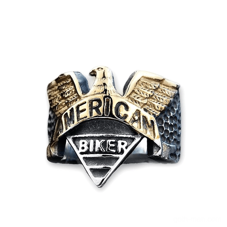 Two-tone gold and silver gothic eagle signet ring with hammered texture and engraved text detailing