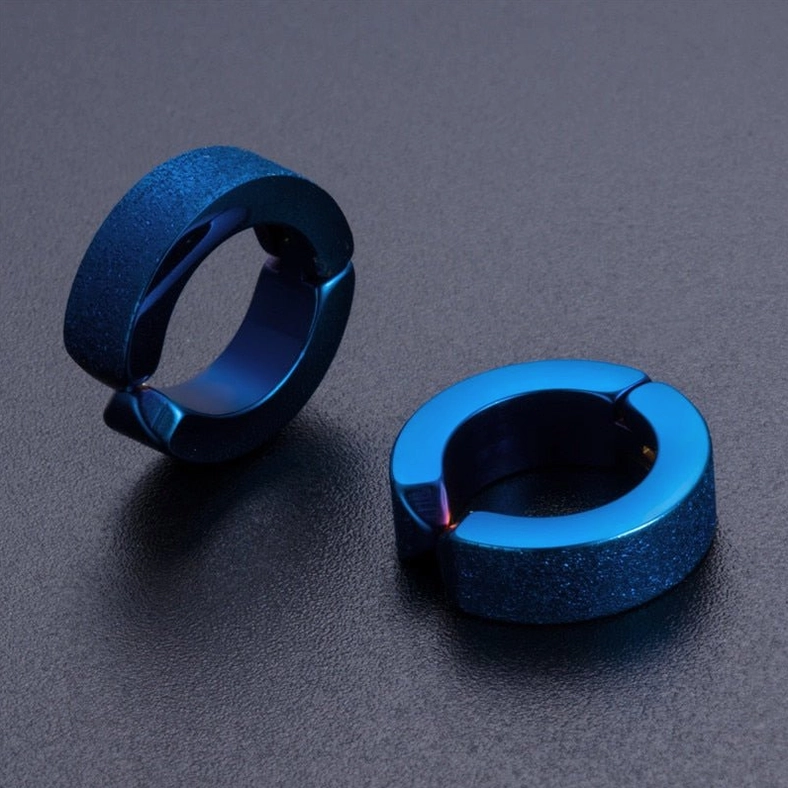 Two gothic stainless steel ear cuffs comparison - blue polished and frosted matte finishes side view