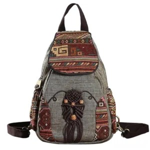 Dark bohemian embroidered canvas backpack with geometric tribal pattern front view - gothic boho handmade travel bag