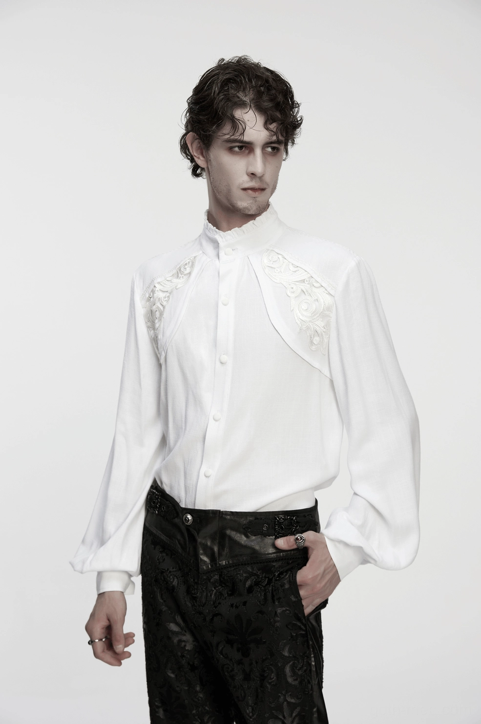 Gothic white embroidered shirt styling on model showing complete silhouette of puff sleeves and collar