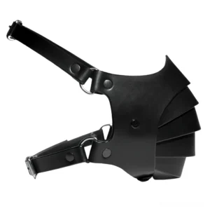 Adjustable gothic leather mask flat lay displaying metal buckles, D-ring fasteners, and layered strap design