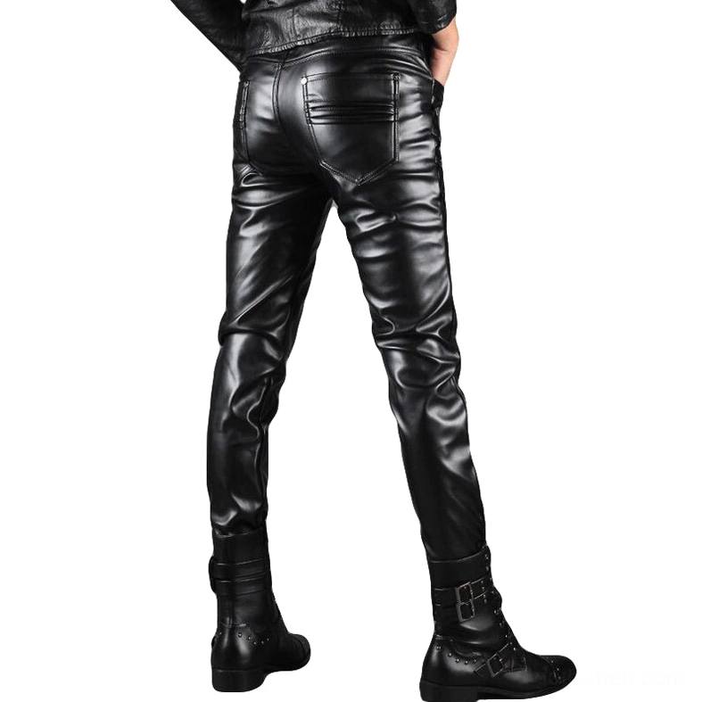 Men's black faux leather pants rear three-quarter view showing back pocket design and slim fit silhouette