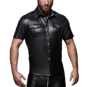 Black faux leather gothic short sleeve shirt front view on male model, silver snap buttons and chest pockets visible