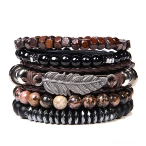 Gothic feather charm multi-strand bracelet set with natural stone beads and braided leather, flat lay view