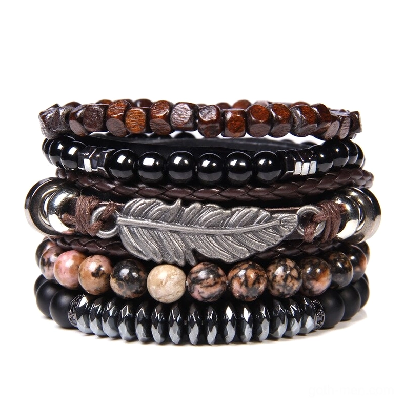 Gothic feather charm multi-strand bracelet set with natural stone beads and braided leather, flat lay view