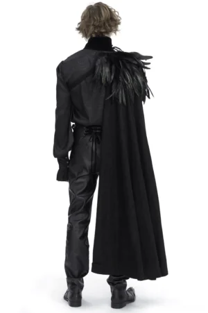 Male model wearing black feathered asymmetric gothic cape, rear full-body view showcasing draped matte fabric and neck feather accents