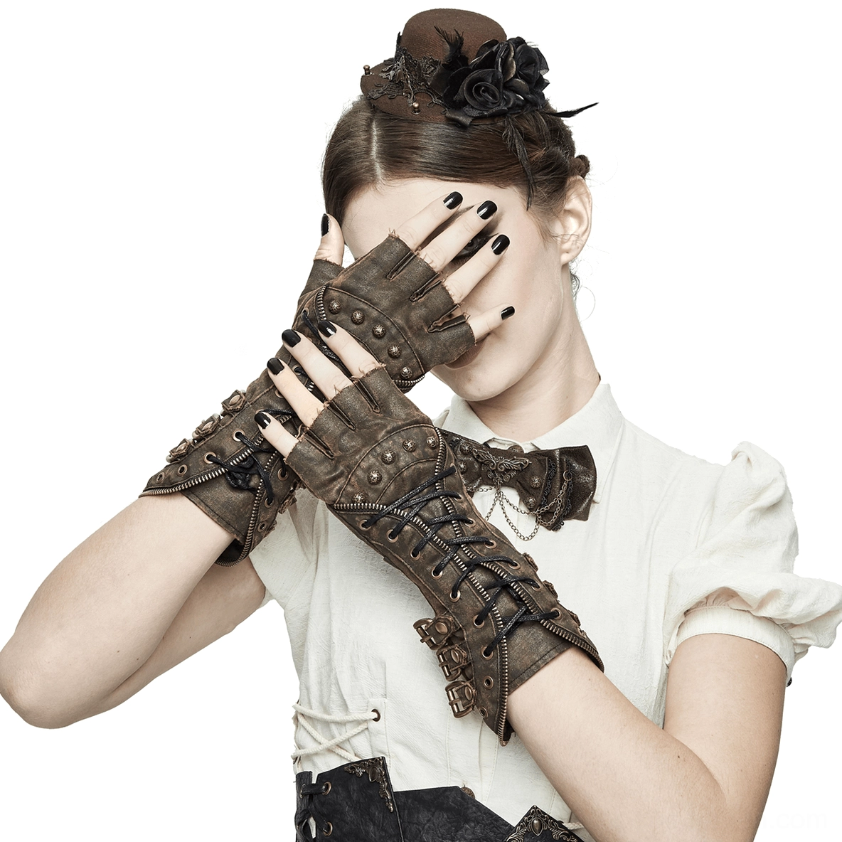 Fingerless steampunk gloves with distressed leather and metal studs worn by female model, studio photography